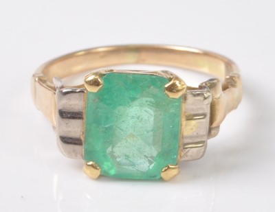 Lot 2505 - A yellow and white metal emerald dress ring,...