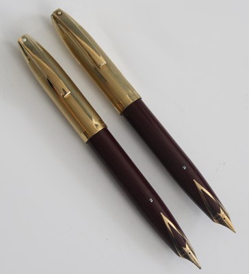 Lot 117 - Two Sheaffer PFM V fountain pens, made in...