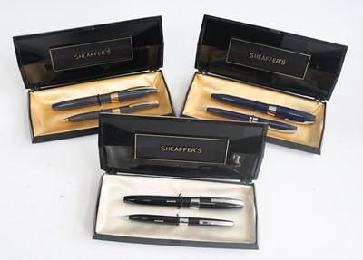 Lot 154 - Three cased Sheaffer PFM fountain pen and...