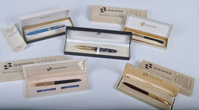 Lot 186 - Five cased Sheaffer fountain pens, comprising...