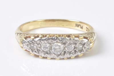 Lot 2510 - A yellow and white metal diamond five stone...