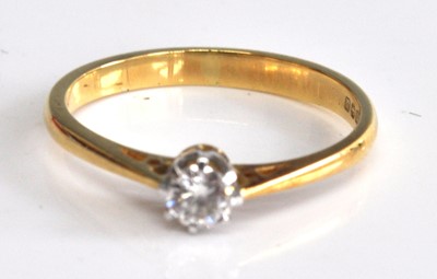 Lot 2522 - An 18ct yellow and white gold diamond single...