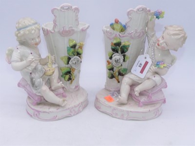 Lot 3 - A pair of Victorian spill holders, each in the...