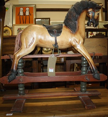 Lot 1193 - A small stained wood child's rocking horse,...