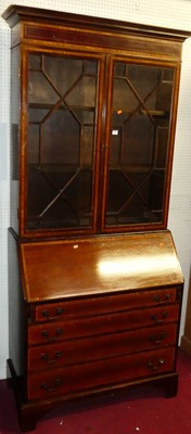 Lot 1128 - An Edwardian mahogany and satinwood inlaid...