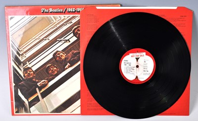 Lot 1041 - The Beatles, a collection of eight LP's to...