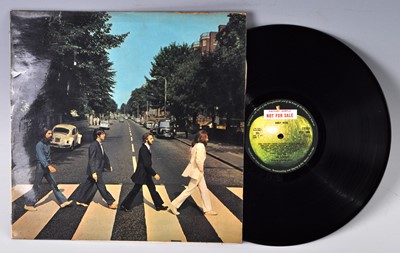 Lot 1041 - The Beatles, a collection of eight LP's to...