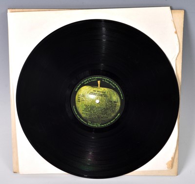 Lot 1041 - The Beatles, a collection of eight LP's to...