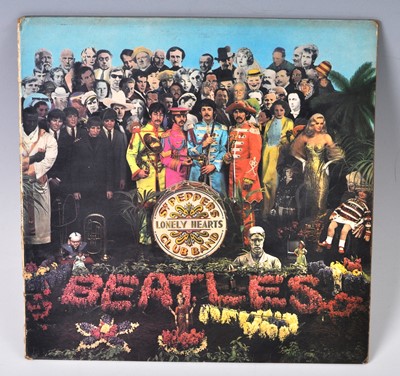 Lot 1041 - The Beatles, a collection of eight LP's to...