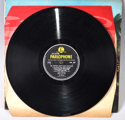 Lot 1041 - The Beatles, a collection of eight LP's to...