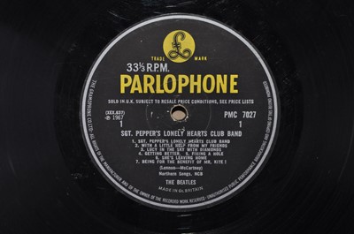 Lot 1041 - The Beatles, a collection of eight LP's to...