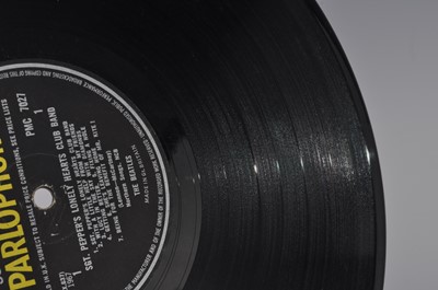 Lot 1041 - The Beatles, a collection of eight LP's to...