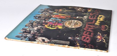 Lot 1041 - The Beatles, a collection of eight LP's to...