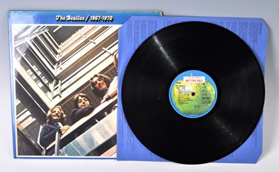 Lot 1041 - The Beatles, a collection of eight LP's to...