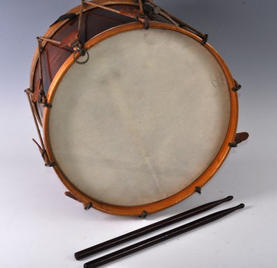 Lot 1012 - A snare drum of typical form, having a stained...