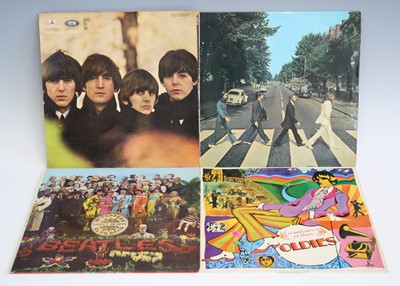 Lot 1143 - The Beatles, a collection of four LP's to...