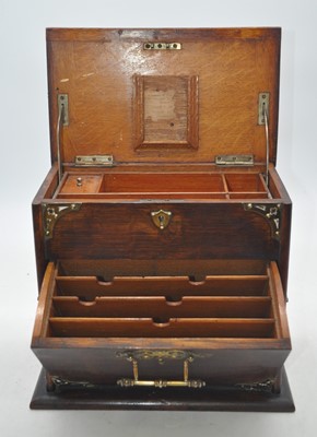 Lot 32 - An early 20th century brass mounted oak cased...