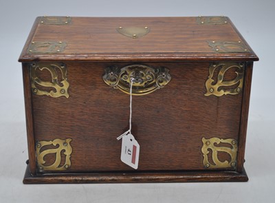 Lot 43 - An early 20th century brass mounted oak...