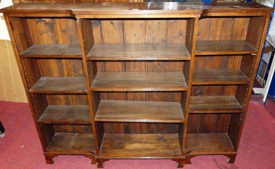 Lot 1123 - A mahogany breakfront open bookshelf, width 152cm