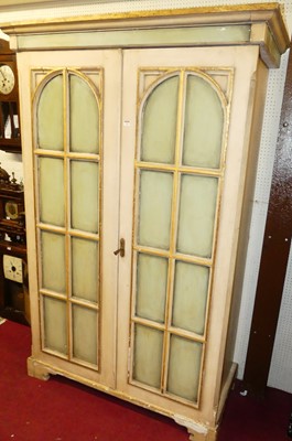 Lot 1129 - A painted and gilt decorated pine double door...
