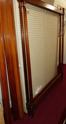 Lot 1165 - A French walnut four poster bed in the Louis...