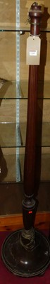 Lot 1168 - A turned and reeded mahogany standard lamp