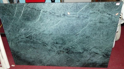 Lot 1175 - A contemporary green variegated marble...
