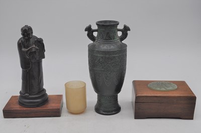 Lot 181 - A Chinese bronzed figure of a scholar together...