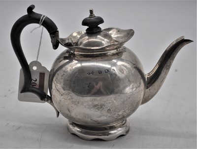Lot 204 - An Edward VII silver bachelor's teapot, of...