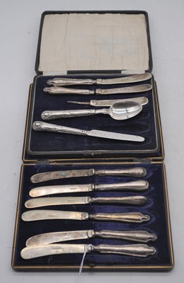 Lot 207 - A collection of matched silver handled...