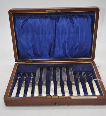 Lot 208 - An Edwardian mother of pearl handled set of...