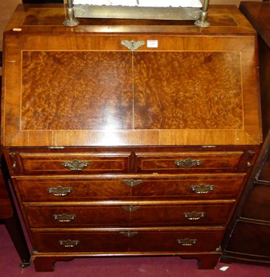 Lot 1189 - A figured walnut and crossbanded slope front...