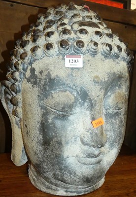 Lot 1203 - A contemporary fibre glass model of a buddha's...
