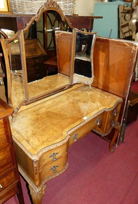 Lot 1216 - An early 20th century figured walnut and cross...