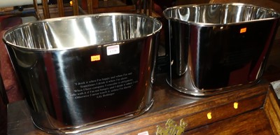 Lot 1228 - A pair of contemporary polished chromed metal...