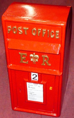 Lot 1234 - A reproduction red and gilt painted...