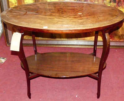 Lot 1240 - An early 20th century mahogany oval two-tier...
