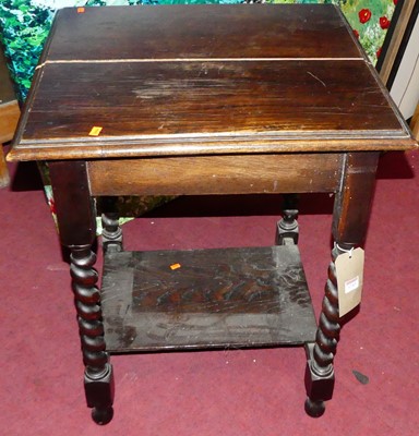 Lot 1243 - An early 20th century oak barley twist turned...