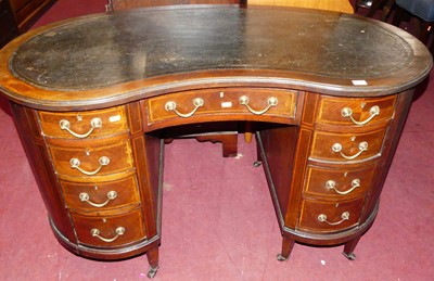 Lot 1247 - A circa 1900 mahogany and leather topped...