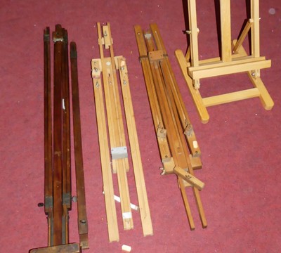 Lot 1279 - Four various beech table-top artists easels