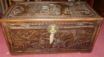Lot 1281 - An early 20th century Chinese heavily relief...