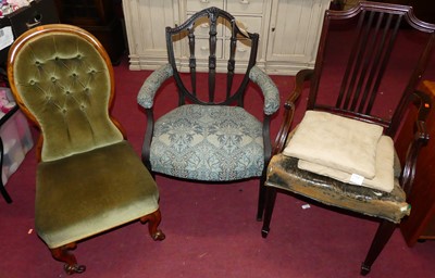 Lot 1307 - A pair of Edwardian mahogany slatback elbow...