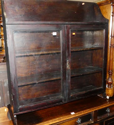 Lot 1327 - An early 20th century stained wood low double...