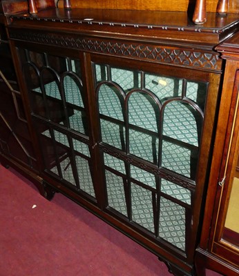 Lot 1341 - A 1930s mahogany double door glazed bookcase,...