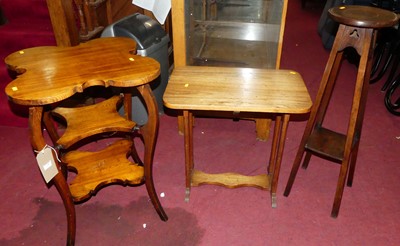 Lot 1348 - An early 20th century oak shaped top...