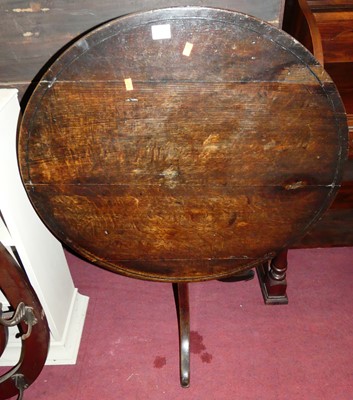 Lot 1364 - A 19th century rustic oak low circular...