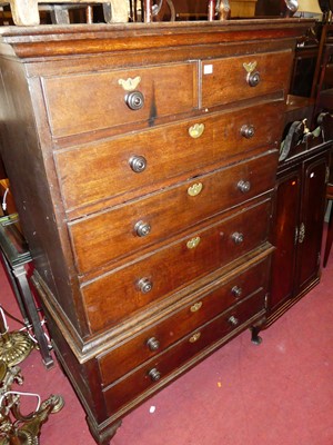 Lot 1369 - An antique oak chest-on-stand, the upper...