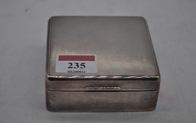 Lot 235 - An Elizabeth II silver clad table cigarette...