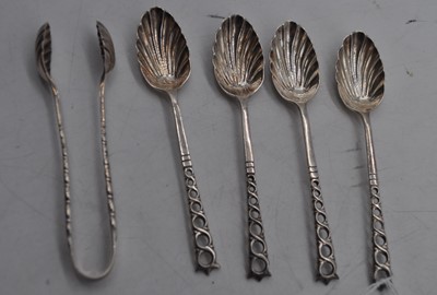Lot 247 - A set of four George VI silver teaspoons each...