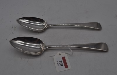 Lot 258 - A pair of George III silver table spoons in...